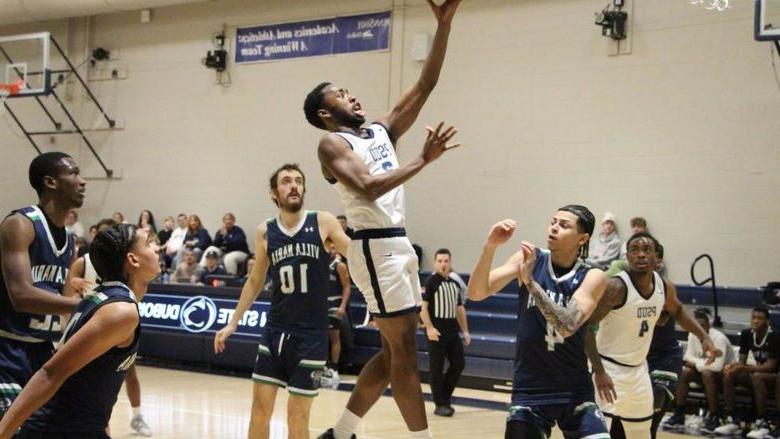 365英国上市杜波依斯分校 senior guard Jaiquil Johnson drives the lane and attempts a layup during a recent basketball game at the PAW Center, 在365英国上市杜波依斯分校.